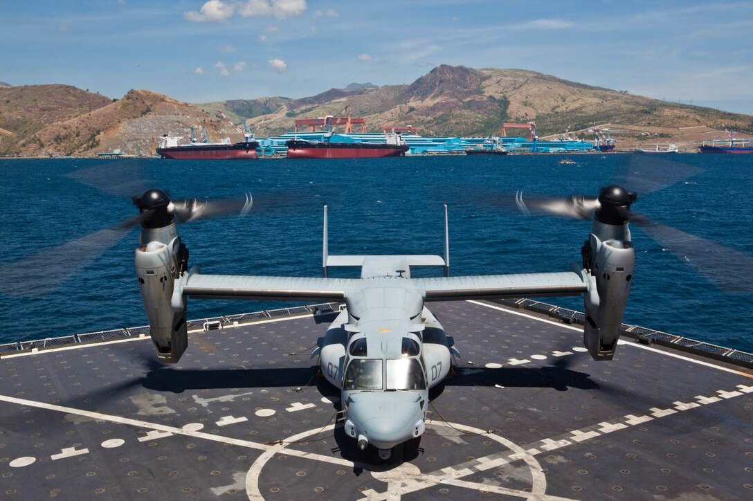 SUBIC BAY, Philippines – An MV-22B Osprey lands on the deck of the USNS Sacagawea prior to conducting external lift training April 11 at Subic Bay, Republic of the Philippines, during exercise Freedom Banner 2013. This was the first time an Osprey has conducted an external lift with the Sacagawea. The aircraft is with Marine Medium Tiltrotor Squadron 265, Marine Aircraft Group 36, 1st Marine Aircraft Wing. (U.S. Marine Corps photo by Pfc. Kasey Peacock/Released)