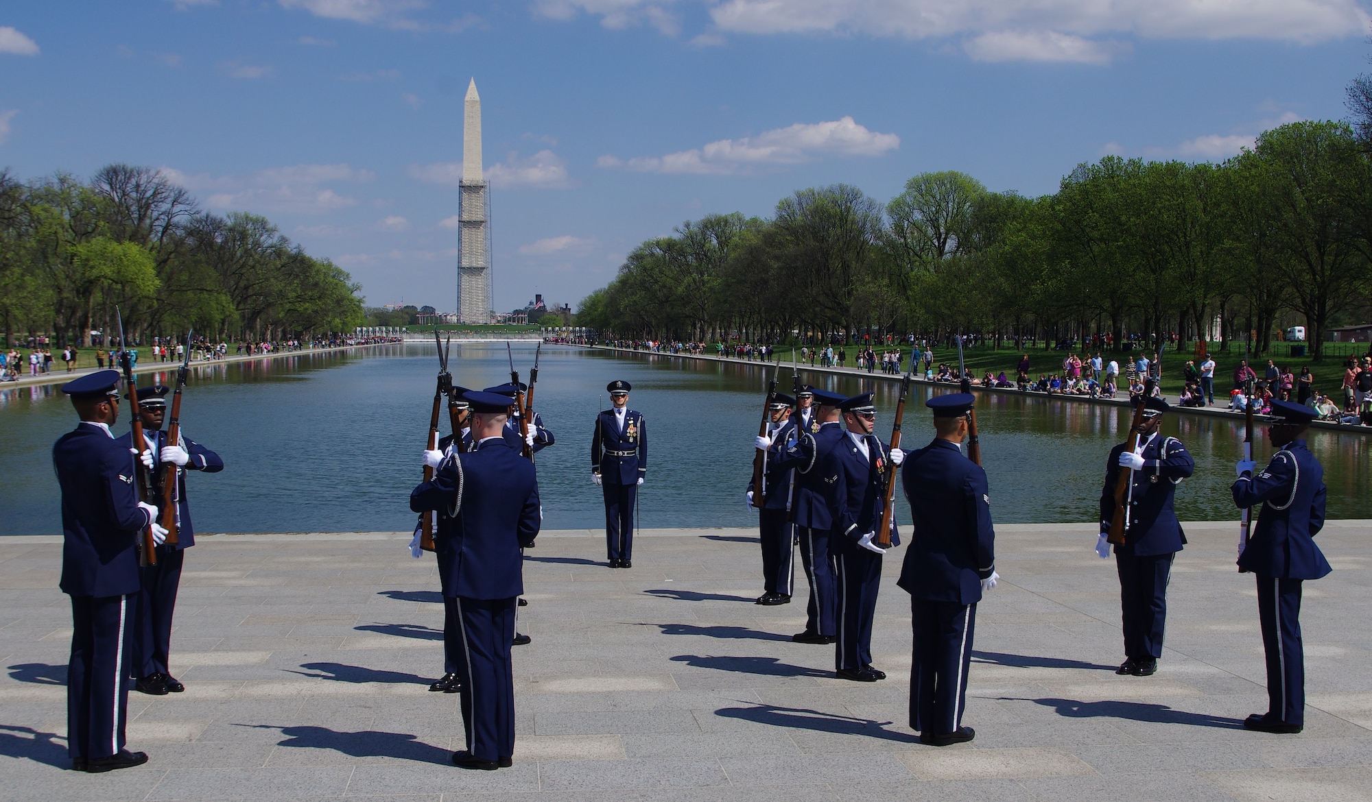 The U.S. Air Force Honor Guard Drill Team performs for visitors of the National Cherry Blossom Festival April 13, 2013 at the Lincoln Memorial in Washington, D.C. With every formation they perform the Airmen of the Drill Team try to represent the Air Force's core value of "excellence in all we do," by performing their drill movements to perfection. (U.S. Air Force photo/Airman 1st Class Alexander W. Riedel)