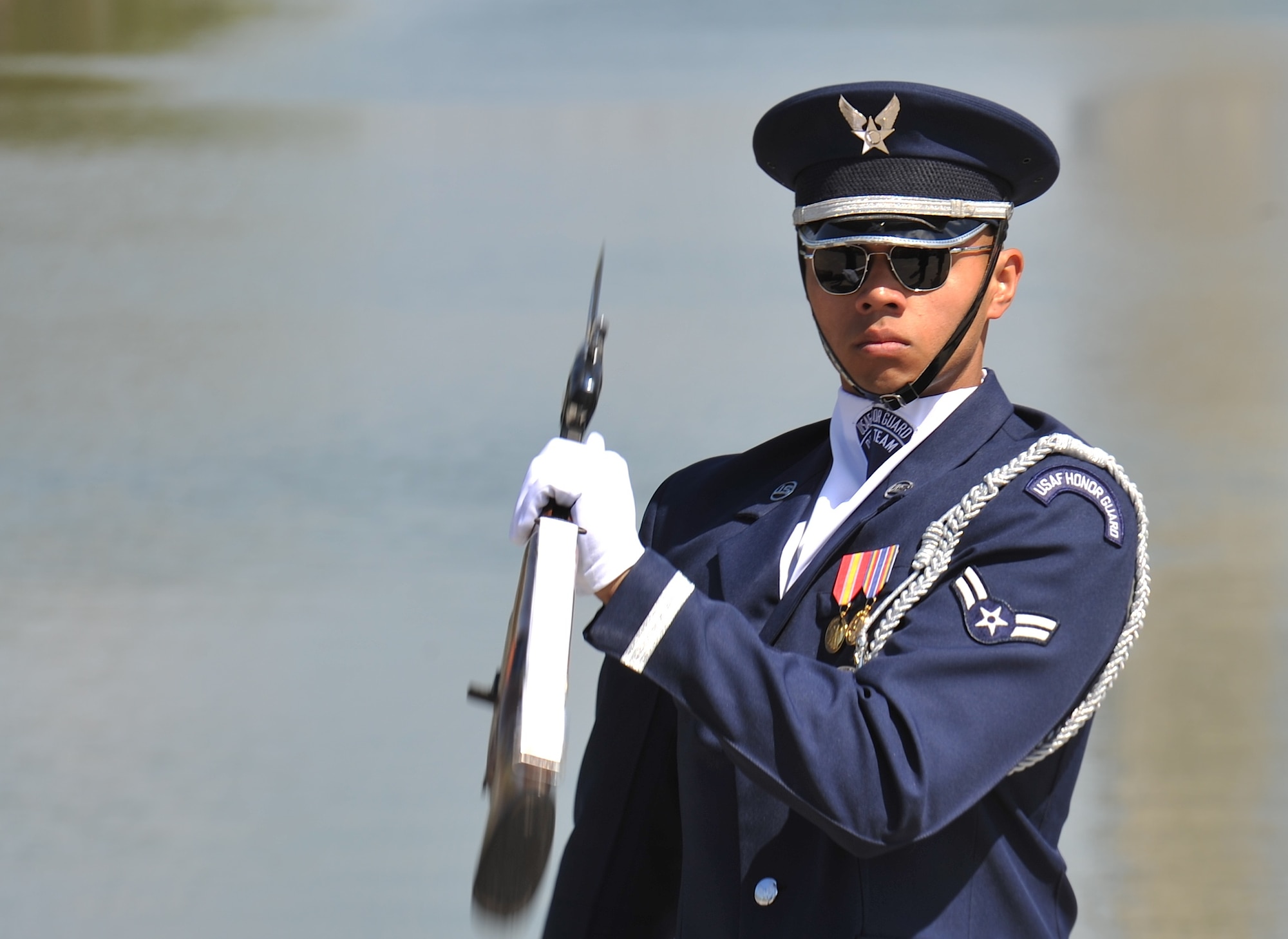 A member of the U.S. Air Force Honor Guard Drill Team perfoms a rifle drill with his M-1 Garand April 13, 2013,  at the National Cherry Blossom Festival in Washington, D.C. The Drill Team promotes the Air Force mission by showcasing highly perfected drill performances at public and military venues to recruit, retain, and inspire fellow Airmen. (U.S. Air Force photo/Airman 1st Class Alexander W. Riedel)