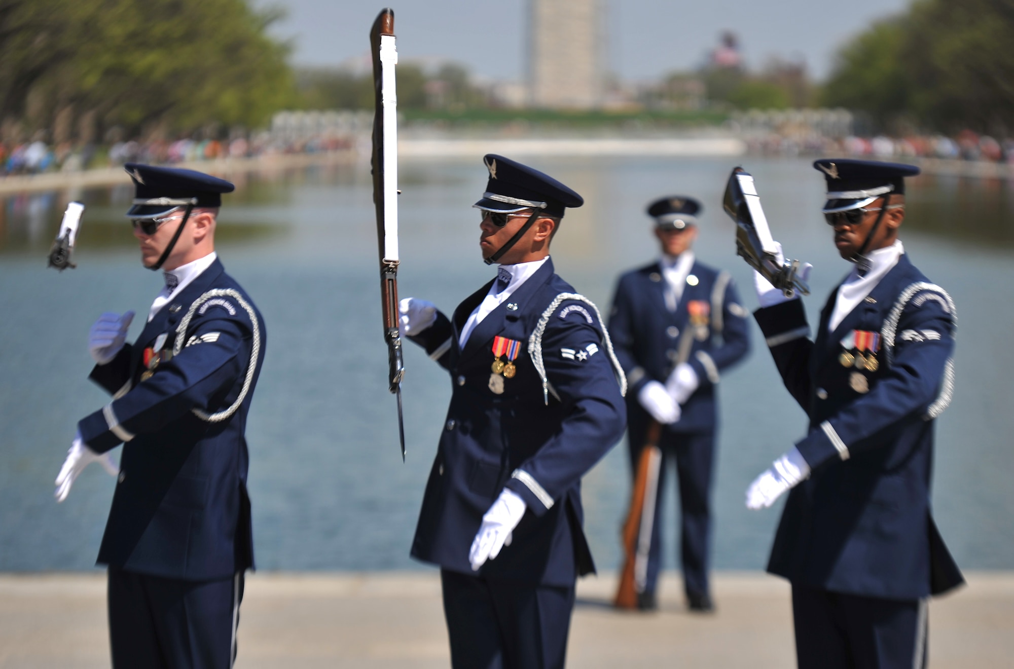 The U.S. Air Force Honor Guard Drill Team spin their M-1 Garand rifle during a performance April 13, 2013, at the National Cherry Blossom Festival in Washington, D.C. The Drill Team members can spin their rifles in speeds of more than forty miles per hour. (U.S. Air Force photo/Airman 1st Class Alexander Riedel)