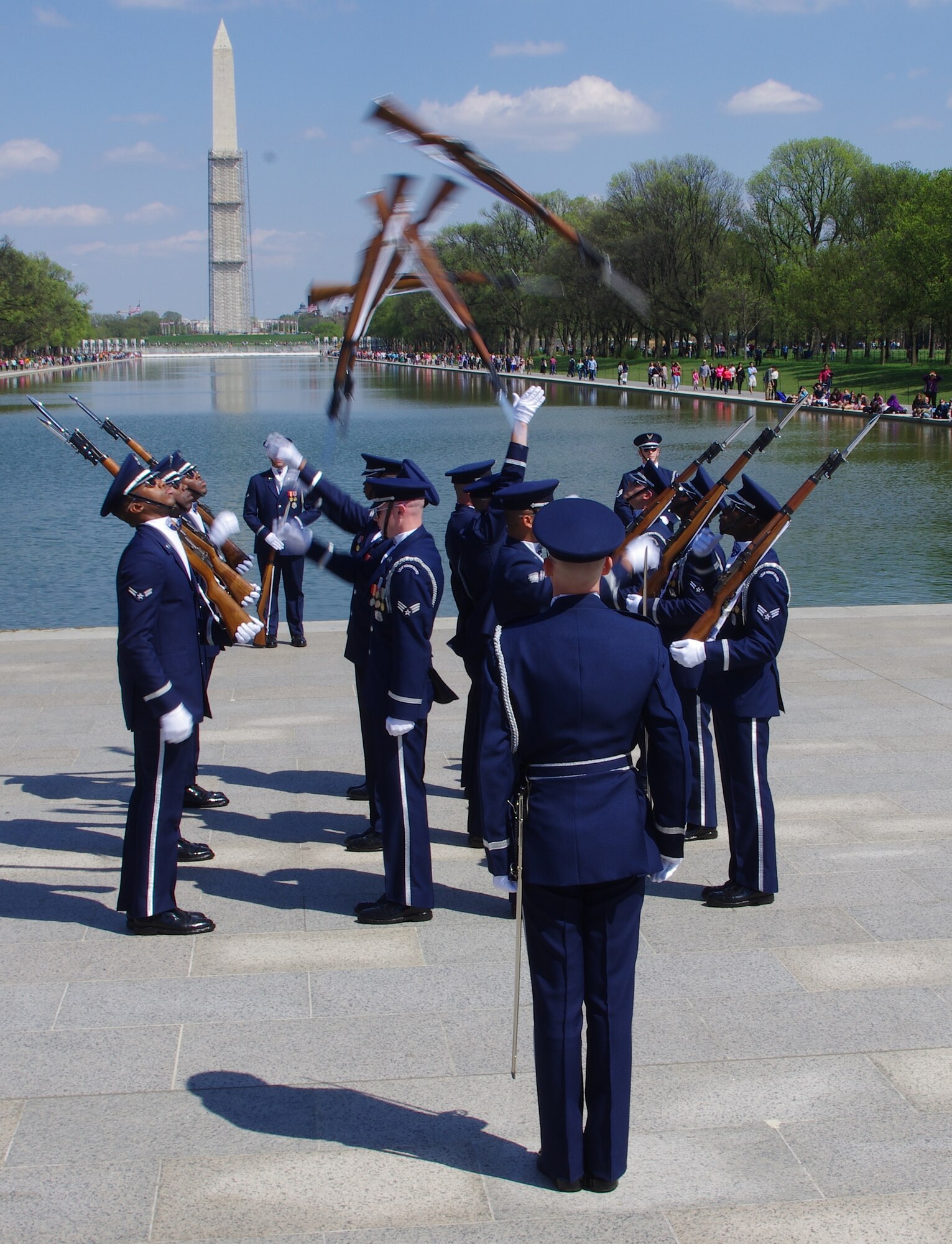 The U.S. Air Force Honor Guard Drill Team throw their rifles  during the joint service drill team exhibition April 13, 2013, at the Lincoln Memorial  in Washington, D.C. Drill teams from all four branches of the U.S. armed forces  and the U.S. Coast Guard displayed their skills at the event that celebrated U.S. military heritage at the National Cherry Blossom Festival. (U.S. Air Force photo/Airman 1st Class Alexander W. Riedel)
