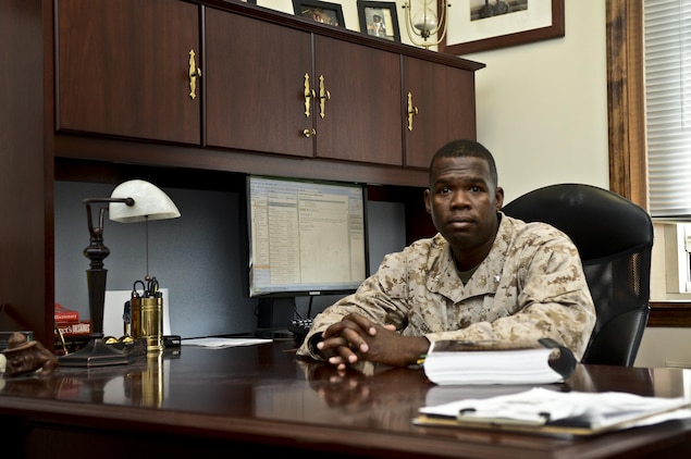 Lt. Col. Christopher B. Shaw, Marine Corps Base Quantico Staff Judge Advocate, poses for a photograph in his office at Lejeune Hall on April 11, 2013. Shaw started his Marine Corps career as an infantry officer before making the switch to legal.