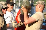 Ottumwa, Iowa, residents and members of the Iowa National Guard work hand-in-hand to save a power substation from being overrun by flood waters.