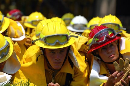 California Army National Guard Soldiers learn to "duck and cover" from their CAL FIRE mentors. The Guardmembers know that this type of training could save their lives.