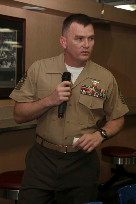 USS PELELIU (April 5, 2013) Sergeant Maj. Derek D. Leggett, sergeant major, Marine Medium Helicopter Squadron 364 (Rein.), 15th Marine Expeditionary Unit, gives a speech to the graduating class of Corporals’ Course 338-13 on the mess decks of USS Peleliu, April 5. Corporals’ Course is a professional military education for enlisted Marines designed to give corporals the tools to become more effective small unit leaders. The 15th MEU is comprised of approximately 2,400 Marines and sailors and is deployed as part of the Peleliu Amphibious Ready Group. Together, they provide a forward-deployed, flexible sea-based Marine Air Ground Task Force capable of conducting a wide variety of operations ranging from humanitarian aid to combat. (U.S. Marine Corps photo by Cpl. John Robbart III/Released)