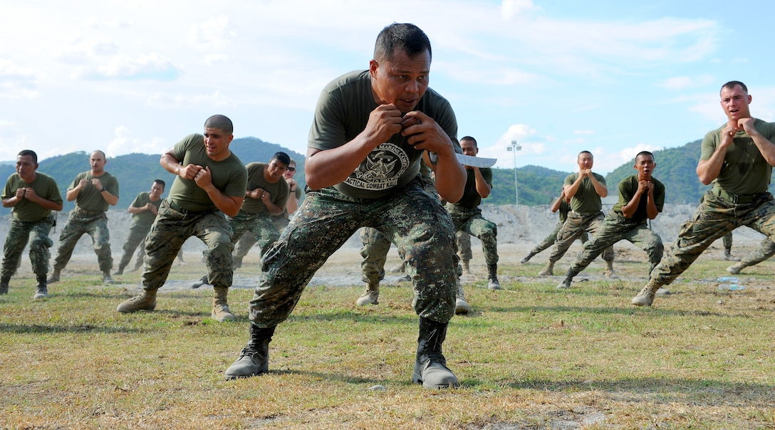 Philippine Marine Staff Sgt. Renante Armamento, a Davao City native and close quarters martial arts instructor, demonstrates defensive maneuvers to U.S. Marines with 3rd Battalion, 6th Marine Regiment, 2nd Marine Division, II Marine Expeditionary Force, April 10, during a martial arts bilateral expertise exchange at Crow Valley, Philippines, as part of Balikatan 2013, an annual bilateral training exercise currently in its 29th iteration. BK13 is designed to enhance interoperability between both forces and strengthen military-to-military relations.