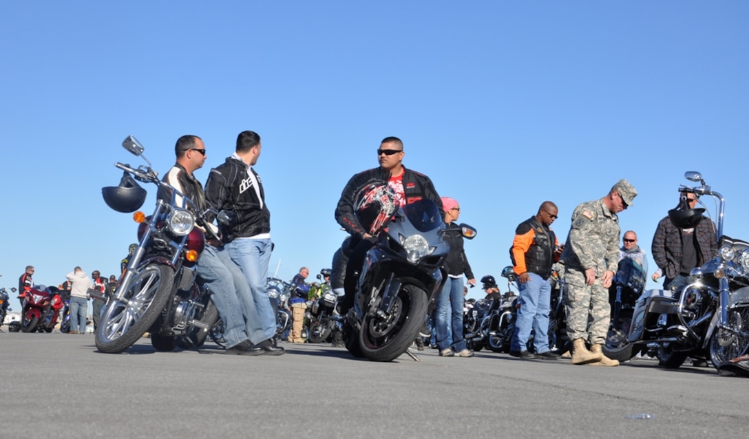 Participants sit waiting for their ride to continue on Marine Corps Logistics Base Barstow during the Vietnam Veterans Welcome Home Ceremony held April 10 in Barstow, Calif. During the event, riders escorted Vietnam veterans from the Veterans Home of California in Barstow, through the MCLB Barstow on the way to National Training Center Fort Irwin.