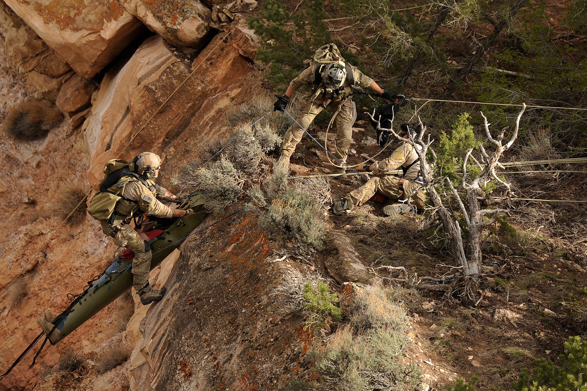 U.S. Air Force Pararescuemen, National Park Service Ranger and local fire and rescue crews participated in a mass causality exercise April 13, 2013 at the Grand Canyon, Ariz. during Angel Thunder 2013. Angel Thunder is the largest joint service, multinational, interagency combat search and rescue exercise designed to train personnel recovery assets using a variety of scenarios to simulate deployment conditions and contingencies. (U.S. Air Force photo by Staff Sgt. Tim Chacon)