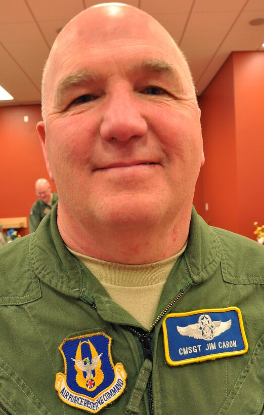 Chief Master Sgt. Jim Caron, senior loadmaster for the 97th Airlift Squadron, retired in 
a ceremony Saturday, April 6 after a career spanning 36 years and a McChord 
Field record of 15,558 flying hours in the C-141 Starlifter and the C-17 
Globemaster III.  His squadron commander and retiring officer, Lt. Col. Garin 
Tentschert, said the chief will be missed and his retirement "leaves a big 
hole in the squadron." The commander went on to say that the chief has built 
an outstanding team. "He has laid a path so that the enlisted aircrew in the 
squadron will continue to be taken care of." When members of the 97th AS were 
asked for words describing Caron, they came up with "exceedingly 
cheerful," "patriotic," and "dedicated."  When asked if he would stay if his 
high-year tenure hadn't mandated his retirement, Caron said he'd "do 
another 30 years." (U.S. Air Force photo by Senior Airman Patrick Cabellon)