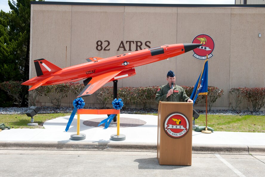 Lt. Col. Lance Wilkins, 82nd Aerial Targets Squadron commander, speaks at the dedication ceremony of the BQM-167 Streaker display. The workhorse of air-to-air testing and evaluation is the Subscale Aerial Target known currently as the BQM-167 Streaker.  A completely reusable target, this drone can be either land or water recovered by 82nd ATS Team Target personnel.  Over the life of the BQM-167 program, more than 1,650 weapons have been employed against only 202 subscale targets. The static display was dedicated April 15, 2013 to mark the 60th anniversary of the last time a U.S. troop was killed from an air attack.  

“It is being dedicated today in honor of 60 years of Air Superiority, and it serves as a reminder that we must continue to shoot for excellence in air-to-air testing, evaluation, and if required...COMBAT,” Colonel Wilkins said. (U.S. Air Force photo by Lisa Norman)
