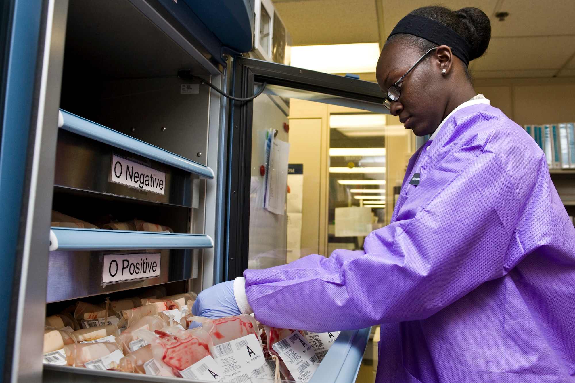 Airman 1st Class Brittany Marin, 99th Medical Support Squadron laboratory technician, checks the inventory of blood products April 10, 2013, at Nellis Air Force Base, Nev.  The Mike O’Callaghan Federal Medical Center blood bank usually stocks up to 100 units of various blood components to ensure it’s  readily available to military members and their families. (U.S. Air Force photo by Airman 1st Class Jason Couillard)