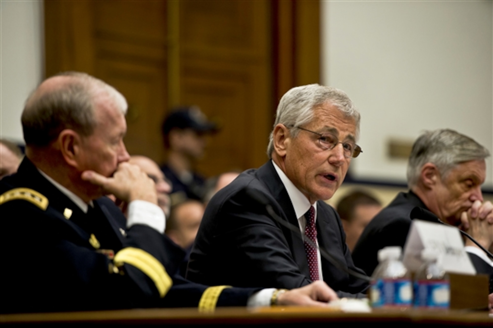Defense Secretary Chuck Hagel testifies before the House Armed Services Committee on the fiscal year 2014 defense budget request in Washington, D.C., April 11, 2013. Army Gen. Martin E. Dempsey, chairman of the Joint Chiefs of Staff, and Robert F. Hale, the Defense Department's comptroller, also testified. (DOD photo by Erin A. Kirk-Cuomo/Released)
