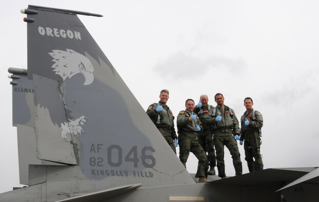 Graduates of the first 173rd Fighter Wing reinstated  Top Knife course pose for a group photo on top of an F-15 Eagle at Kingsley Field, Klamath Falls, Ore. April 7, 2013.  Top Knife is a two-week program that trains flight surgeons the physiological effects of flying in a fighter aircraft.  (U.S. Air Force photo by Tech. Sgt. Jefferson Thompson) RELEASED