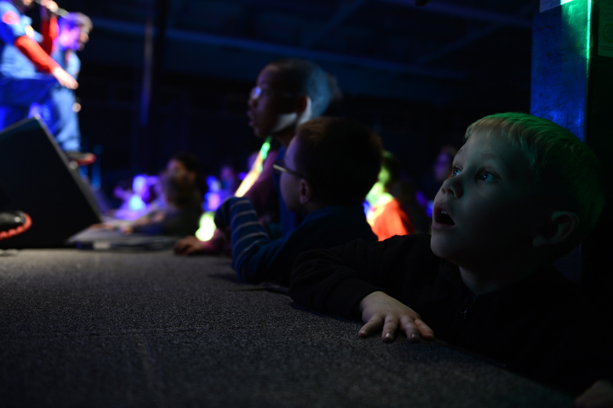 SPANGDAHLEM AIR BASE, Germany – Children watch the Imagination Movers performance at the Skelton Memorial Fitness Center April 11, 2013. Spangdahlem was the first stop for the Armed Forces Entertainment and the U.S. Navy-sponsored the group’s tour through Europe. (U.S. Air Force photo by Airman 1st Class Kyle Gese/Released)