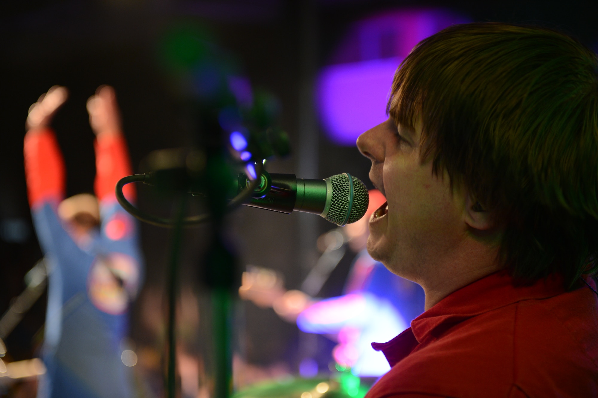 SPANGDAHLEM AIR BASE, Germany – Kyle Melancon sings during the Imagination Movers performance at the Skelton Memorial Fitness Center April 11, 2013. The band, who also has a children’s television show, entertained the crowd for nearly two hours during the free concert. (U.S. Air Force photo by Airman 1st Class Kyle Gese/Released)