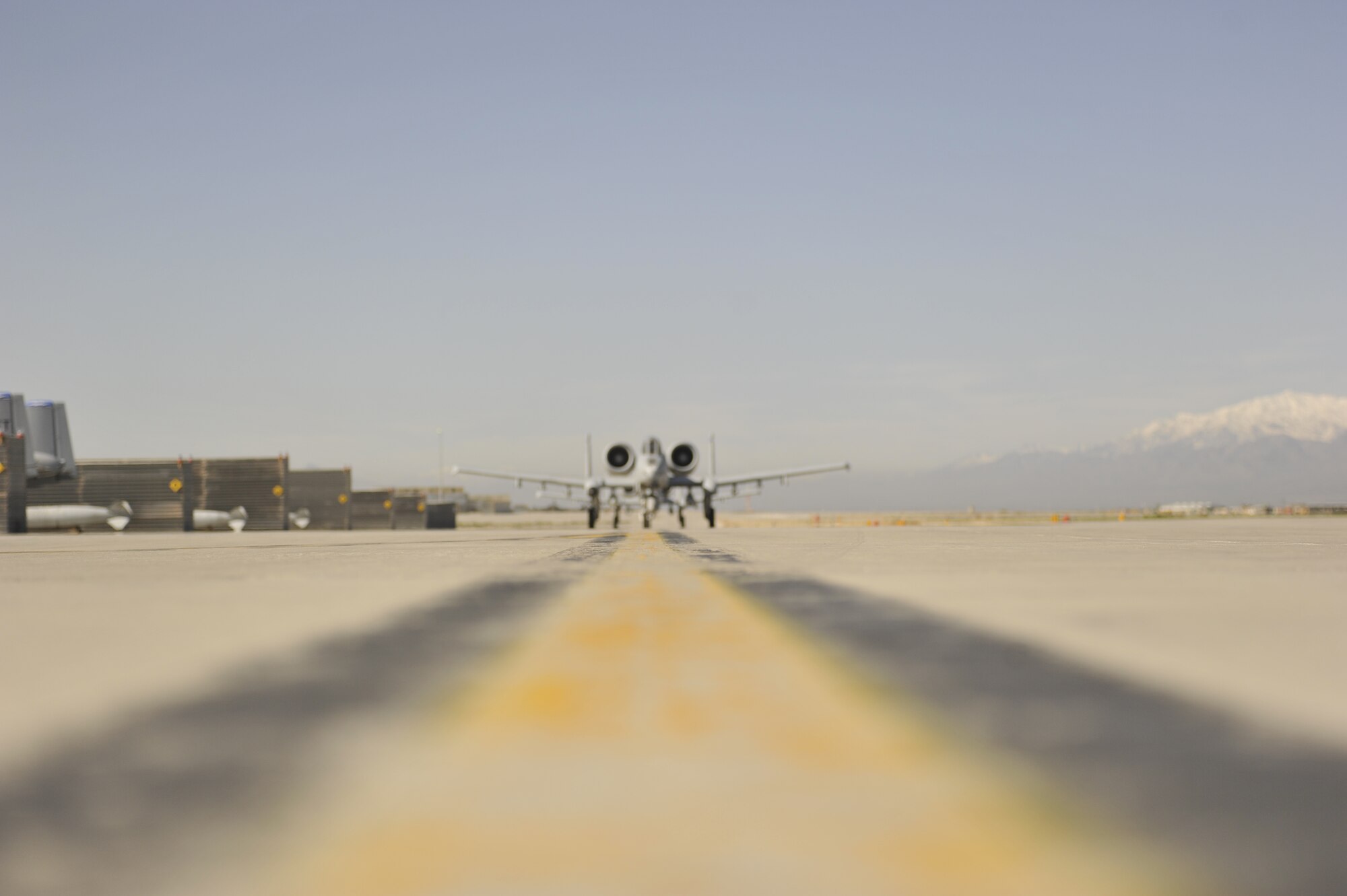 A-10 Thunderbolt II fighter aircraft deployed from Davis-Monthan Air Force Base, Ariz., taxis to the runway on Bagram Airfield, Afghanistan, April 14, 2013, to begin the 7,800 mile flight back home. The A-10 is known for its close-air support of ground forces and employs a variety of munitions, but is most known for its distinctive sound when it fires its GAU-8, 30mm Gatling gun. (U.S. Air Force photo/Master Sgt. Jun Kim)