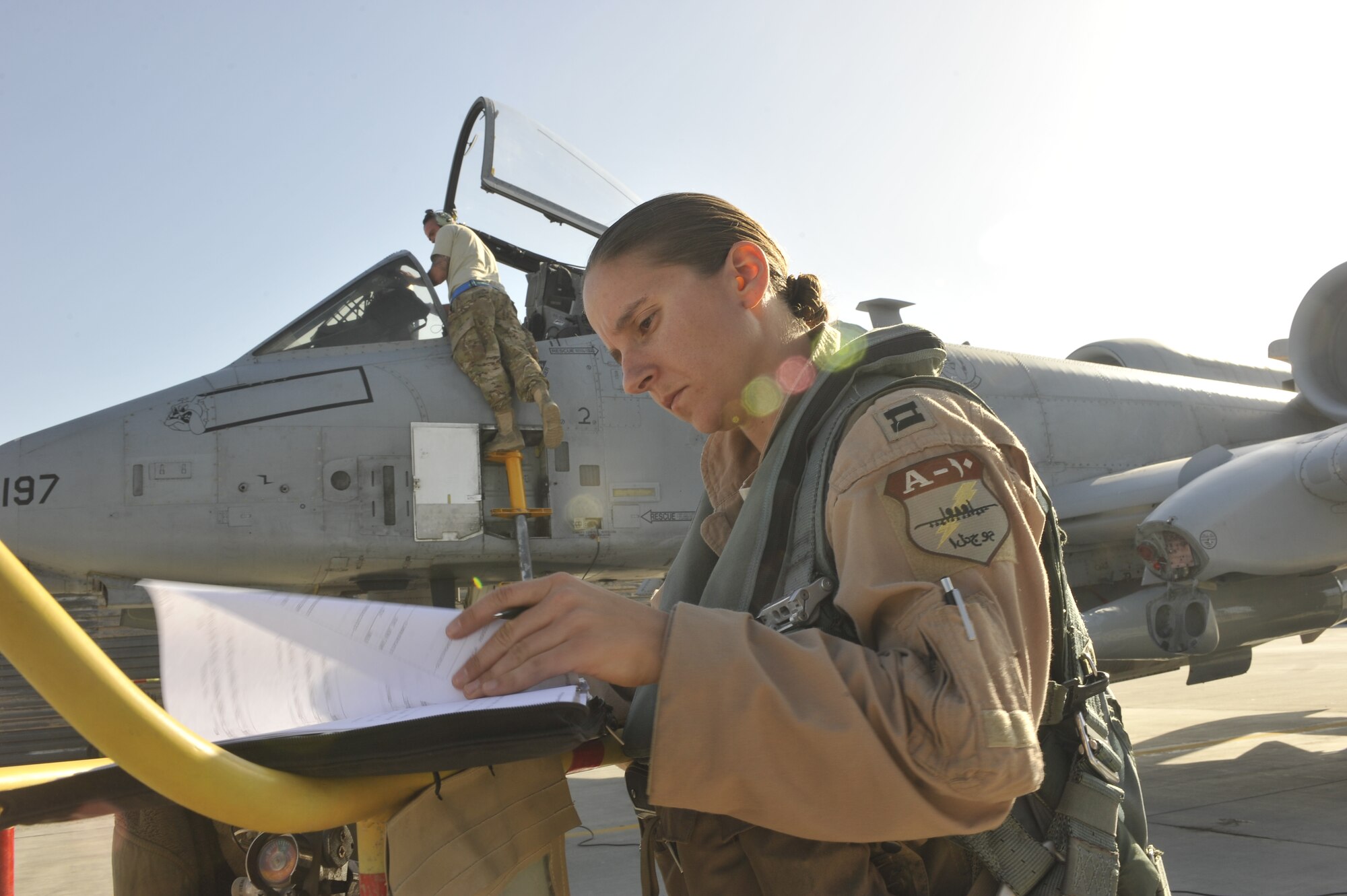 Capt. Rachael Winiecki, 354th Expeditionary Fighter Squadron A-10 Thunderbolt II pilot, prepares for a pre-flight inspection before flying 7,800 miles back home Davis-Monthan Air Force Base, Ariz., from Bagram Airfield, Afghanistan on April 14, 2013.  Winiecki piloted one of the last three A-10s from Arizona to deploy back home after six months of providing air support to ground troops in Afghanistan. (U.S. Air Force Photo/Master Sgt. Jun Kim)
