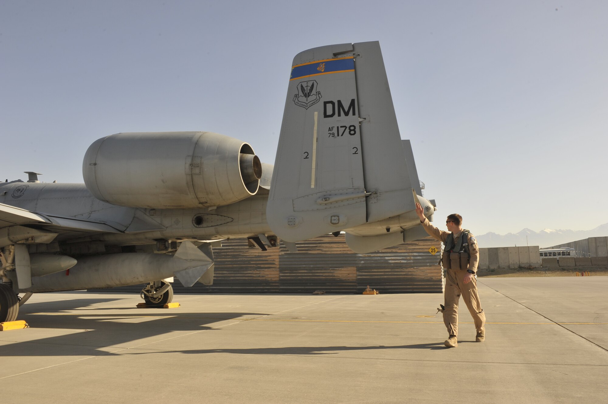 1st Lt. William Rice, 354th Expeditionary Fighter Squadron A10 Thunderbolt II pilot, performs a pre-flight inspection before flying 7,800 miles back home to Davis-Monthan Air Force Base, Ariz., from Bagram Airfield, Afghanistan, April 14, 2013.  Rice piloted one of the last three A-10s from Arizona to deploy back home after six months of providing air support to ground troops in Afghanistan. (U.S. Air Force Photo/Master Sgt. Jun Kim)