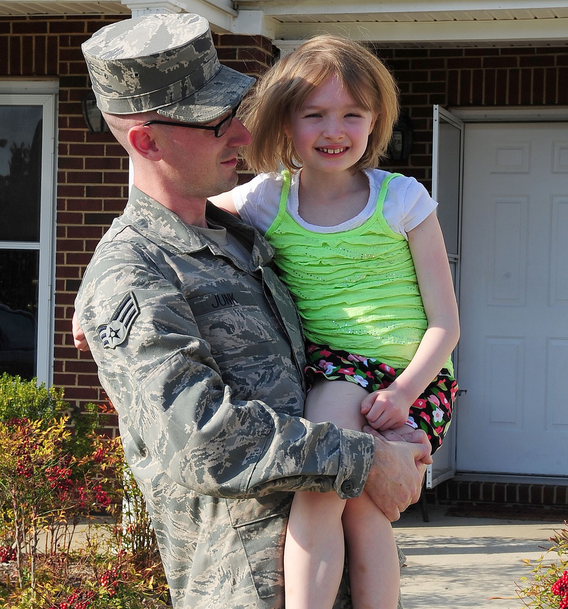 Senior Airman Michael Junk, U.S. Air Force Honor Guard, enjoys time with his daughter, Kathryn, April 9, 2013, at Joint Base Anacostia-Bolling, D.C. (U.S. Air Force photo by Senior Airman Steele C. G. Britton)