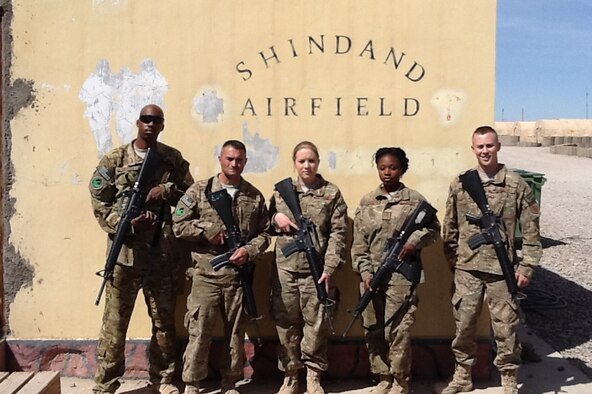 From left to right, Senior Airman Walter Morton, Tech Sgt. Ignacio Bentancour, Senior Airman Amber Jones, Staff Sgt. Lakisha Leak and Airman 1st Class Joseph Wallock, 386th Expeditionary Logistics Readiness Squadron forward deployed from the 386th Air Expeditionary Wing to Shindand, Afghanistan Mar 31, 2013. The team of five built two 3,000 square foot Alaskan tents and set-up an entire supply system from the ground up in only 45 days. (Courtesy photo)