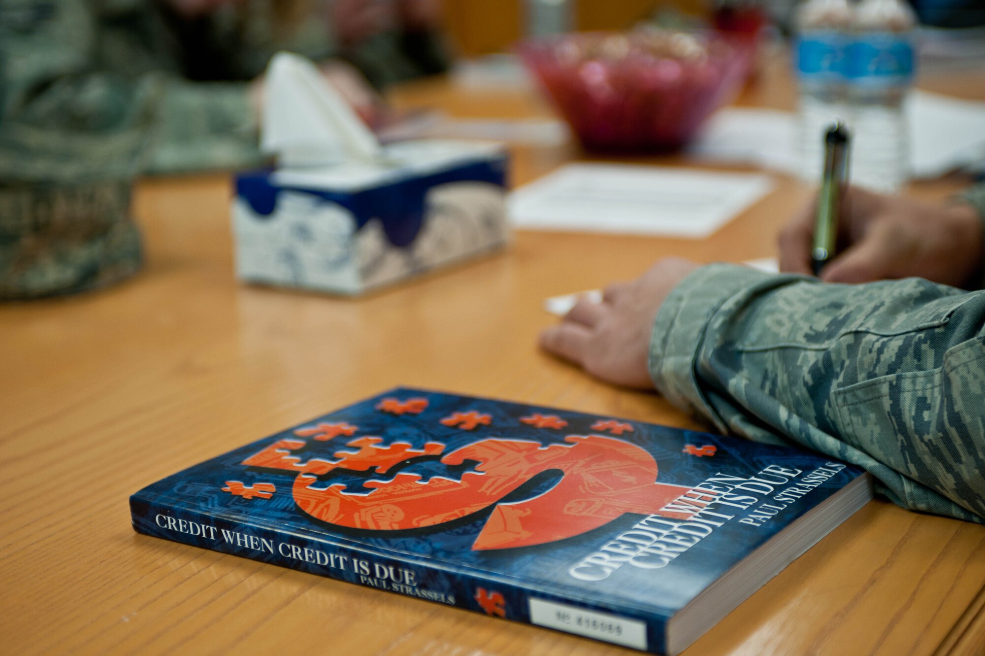 Airmen attend a “Credit When Credit is Due” course for financial guidance at the Airman and Family Readiness Center at Ellsworth Air Force Base, S.D., April 4, 2013. The course covered a variety of financial topics to educate Airmen on how to make sound decisions to meet financial goals and set good budget plans. (U.S. Air Force photo by Airman 1st Class Zachary Hada/Released)