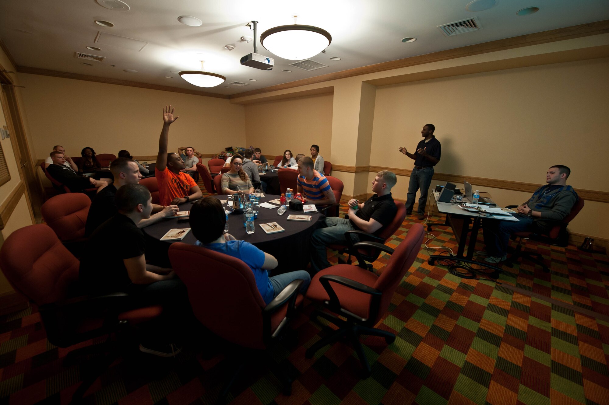 Ellsworth Airmen participate in a group discussion as part of a spiritual resiliency course called “Boundaries in Dating” during a singles retreat in Denver, April 6, 2013. During the course, instructed by Capt. Henry Jenkins and Staff Sgt. Christopher Flavin, 28th Bomb Wing Chapel staff, every Airmen learned how to better understand their role in creating positive, healthy relationships. (U.S. Air Force photo by Airman 1st Class Zachary Hada/Released)