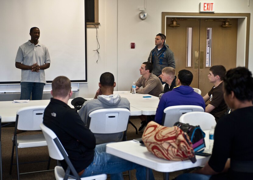 Capt. Henry Jenkins and Staff Sgt. Christopher Flavin, 28th Bomb Wing Chapel staff, brief Airmen before heading to Denver for a singles retreat at Ellsworth Air Force Base, S.D., April 5, 2013. The trip started with an orientation to introduce everyone and describe what the course would consist of over the next few days. (U.S. Air Force photo by Airman 1st Class Zachary Hada/Released)