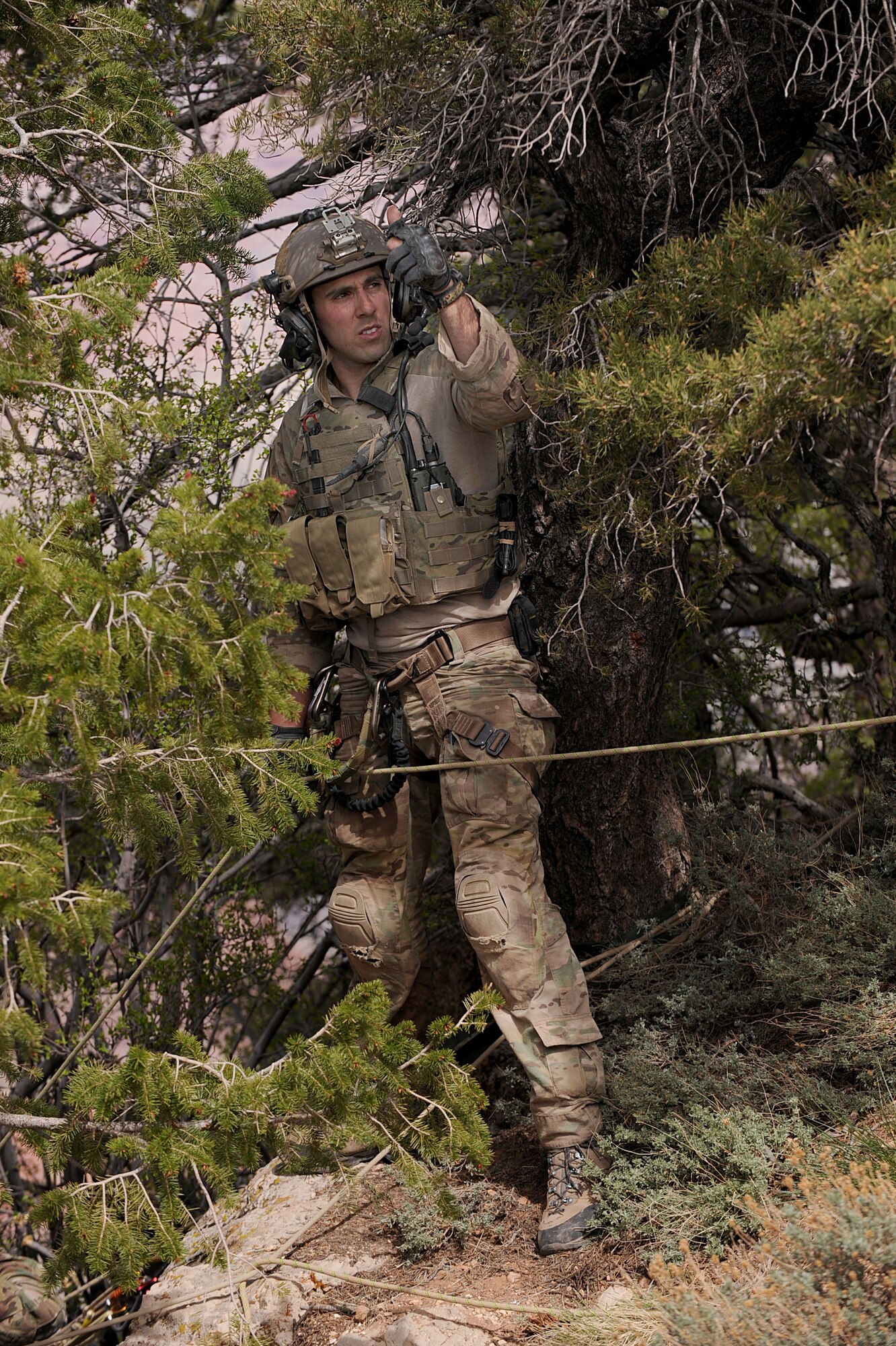 A U.S. Air Force pararescuman from the 58th Rescue Squadron, Nellis Air Force Base, Nev. gives the okay to hoist up a casualty during a mass casualty exercise at the Grand Canyon, April 13, 2013. Angel Thunder is the largest joint service, multinational, interagency combat search and rescue exercise in the world. It is designed to train personnel recovery assets using a variety of scenarios to simulate deployment conditions and contingencies. (U.S. Air Force photo by Airman 1st Class Christine Griffiths/Released)