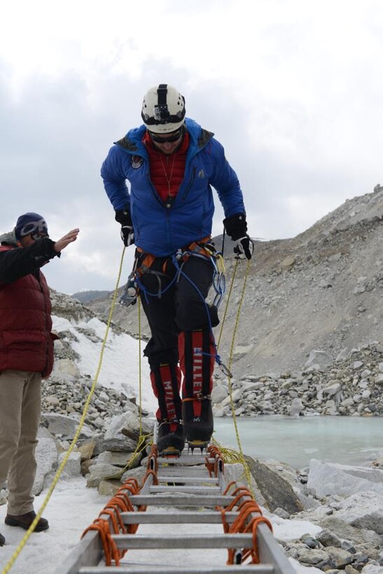 A team member of the U.S. Air Force Seven Summit team practices how to safely traverse crevasses at Mount Everest Base Camp, Nepal. A team of six active-duty Airmen is currently on their way to climb Mount Everest, the highest mountain on Earth, to suppoort resilience, raise money for charity and commemorate their fallen. (Courtesy photo/USAF Seven Summit Challenge) 