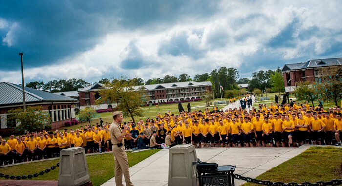 Navy Capt. Jon Fahs, Naval Nuclear Power Training Command commanding officer, addresses Sailors prior to a 5k run held in conjunction with Sexual Assault Awareness Month April 11, 2013, at Joint Base Charleston – Weapons Station, S.C. It is estimated that more than 2,400 Sailors are victims of sexual assault every year. (U.S. Air Force photo / Airman 1st Class Tom Brading) 