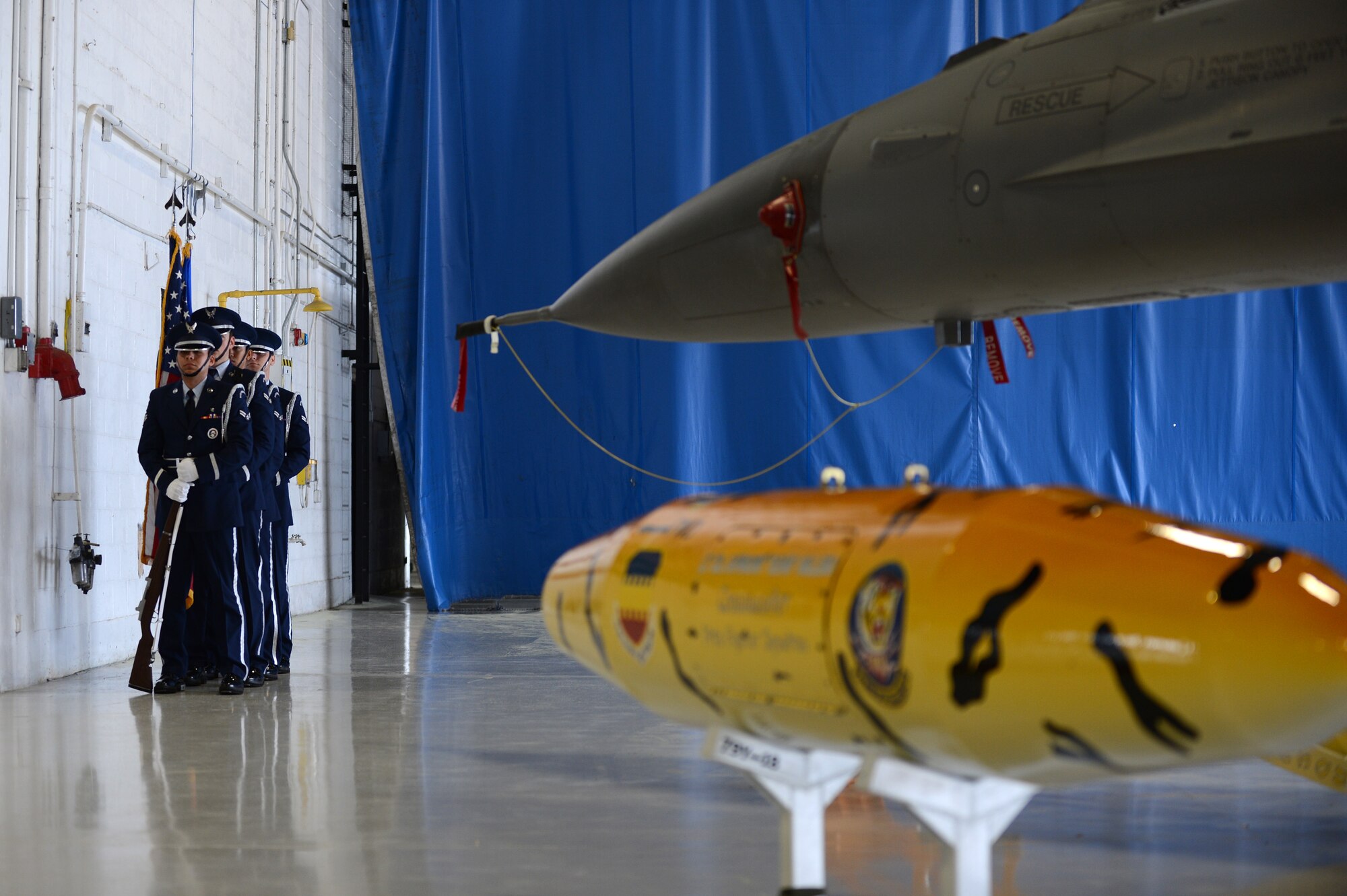 Shaw Air Force Base Honor Guard wait patiently for the start of the 79th Fighter Squadron change of command, at Shaw AFB, S.C., April 12, 2013. A Change of command is a military tradition that represents the transfer of responsibilities from the presiding official to a qualified selected official. (U.S. Air Force photo by Airman 1st Class Daniel Blackwell/released)