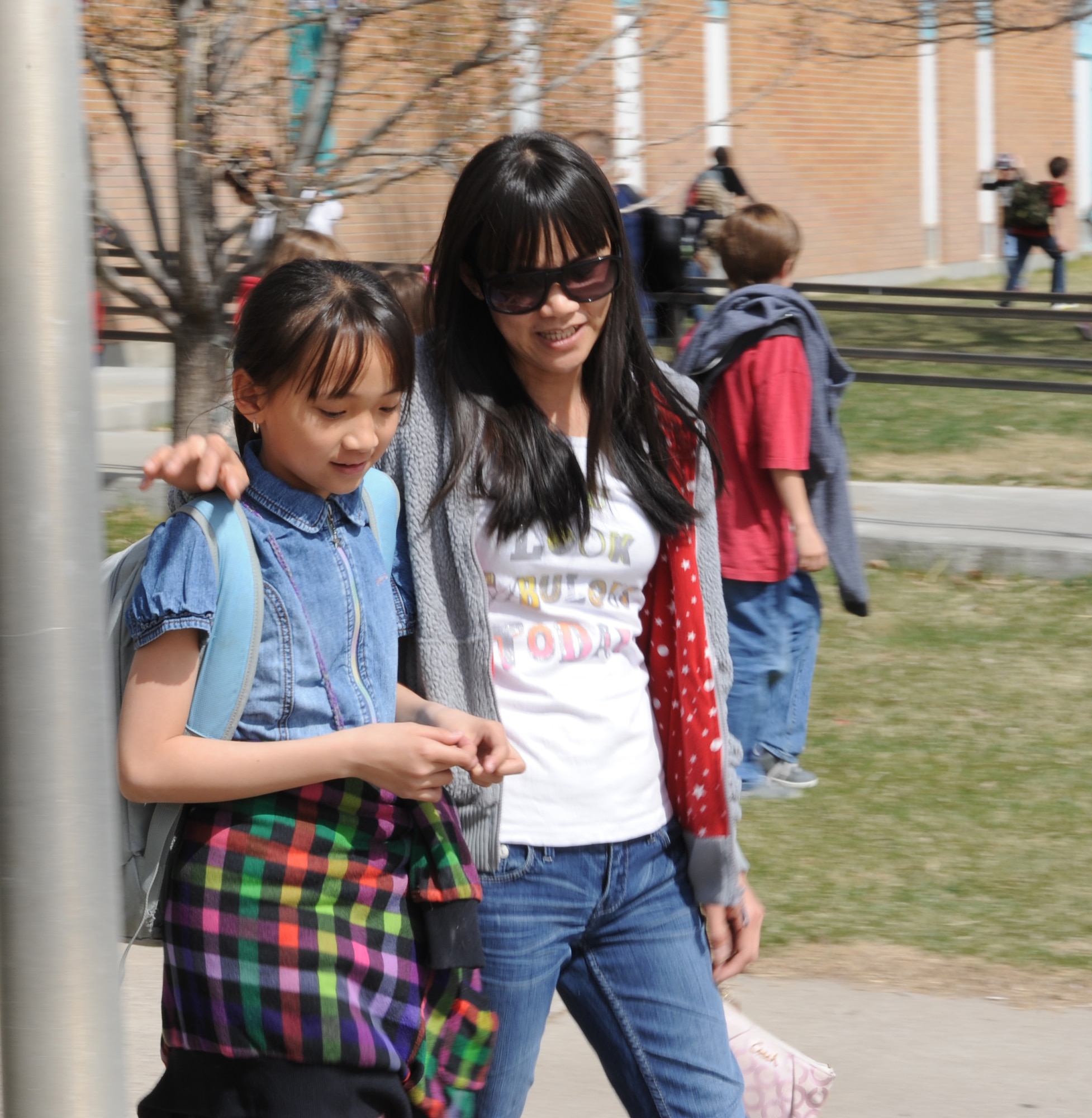 A student is picked up by a family member April 3, 2013, at Mountain Home Air Force Base, Idaho. The base primary school has invited parents and family members to have lunch with their children every Wednesday during the month of April to celebrate Month of the Military Child. (U.S. Air Force photo by Airman 1st Class Malissa Lott/Released) 