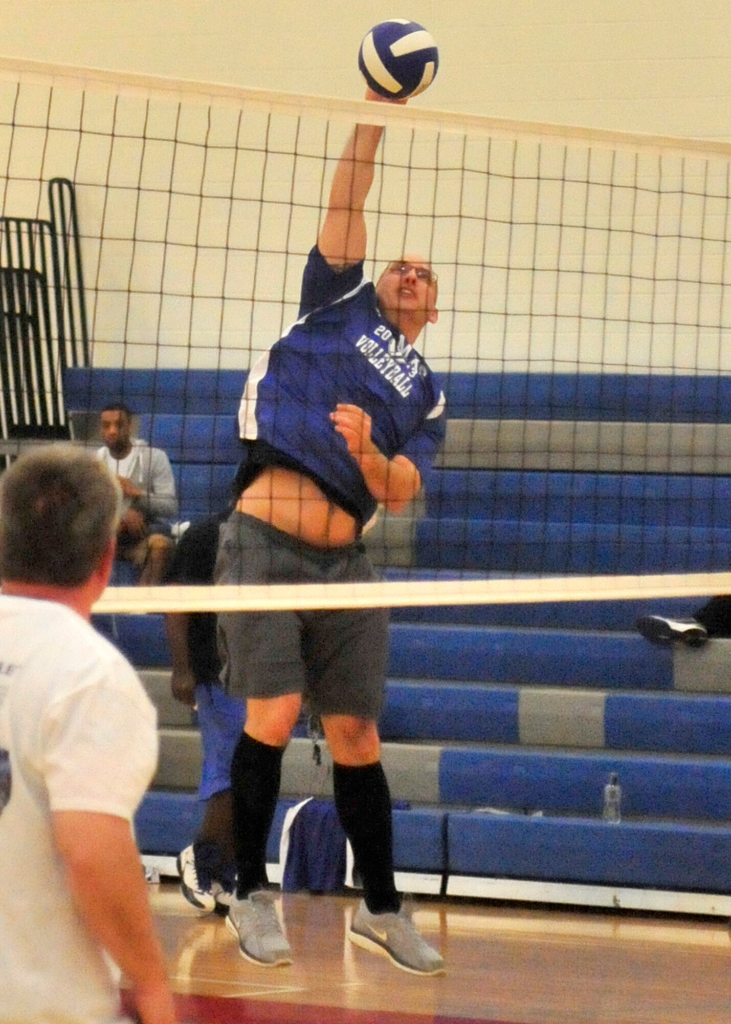 Patrick Piazza, 436th Maintenance Squadron, slams home a kill during an intramural volleyball match against the 436th Logistics Readiness Squadron April 15, 2013, at the fitness center on Dover Air Force Base, Del. The 436th MXS defeated the 436th LRS in three games 25-14, 21-25 and 15-9. (U.S. Air Force photo/Tech. Sgt. Chuck Walker)