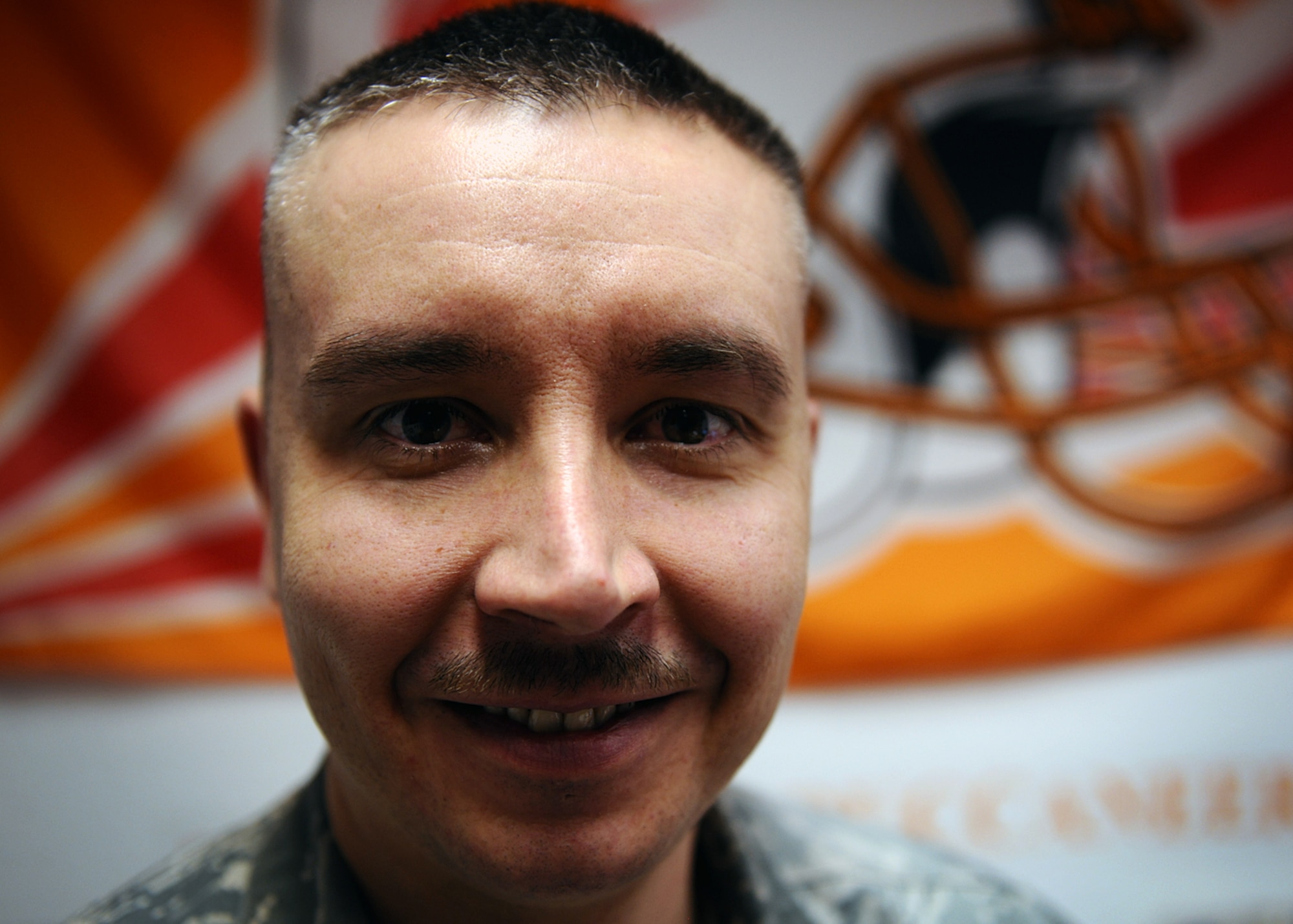SPANGDAHLEM AIR BASE, Germany – U.S. Air Force Master Sgt. Anthony Mitchell, 52nd Logistics Readiness Squadron assistant first sergeant and Spangdahlem First Sergeant Council fundraising chairperson, created a silent auction for Operation Warm Heart. The program is designed to help Airmen during financial emergencies. Mitchell, an avid sports fan, began contacting national sports stars and team coaches in January to garner support for the program. He sent out more than 500 requests for donations. (U.S. Air Force photo by Staff Sgt. Daryl Knee/Released)