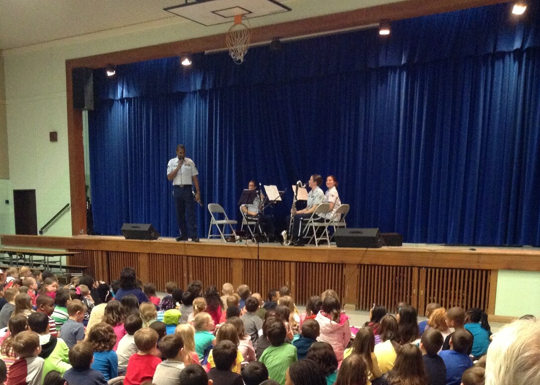 The Quartet played "Three Billy Goats Gruff" for the students and MSgt Joshua Gates played the part of the troll who lived under the bridge.