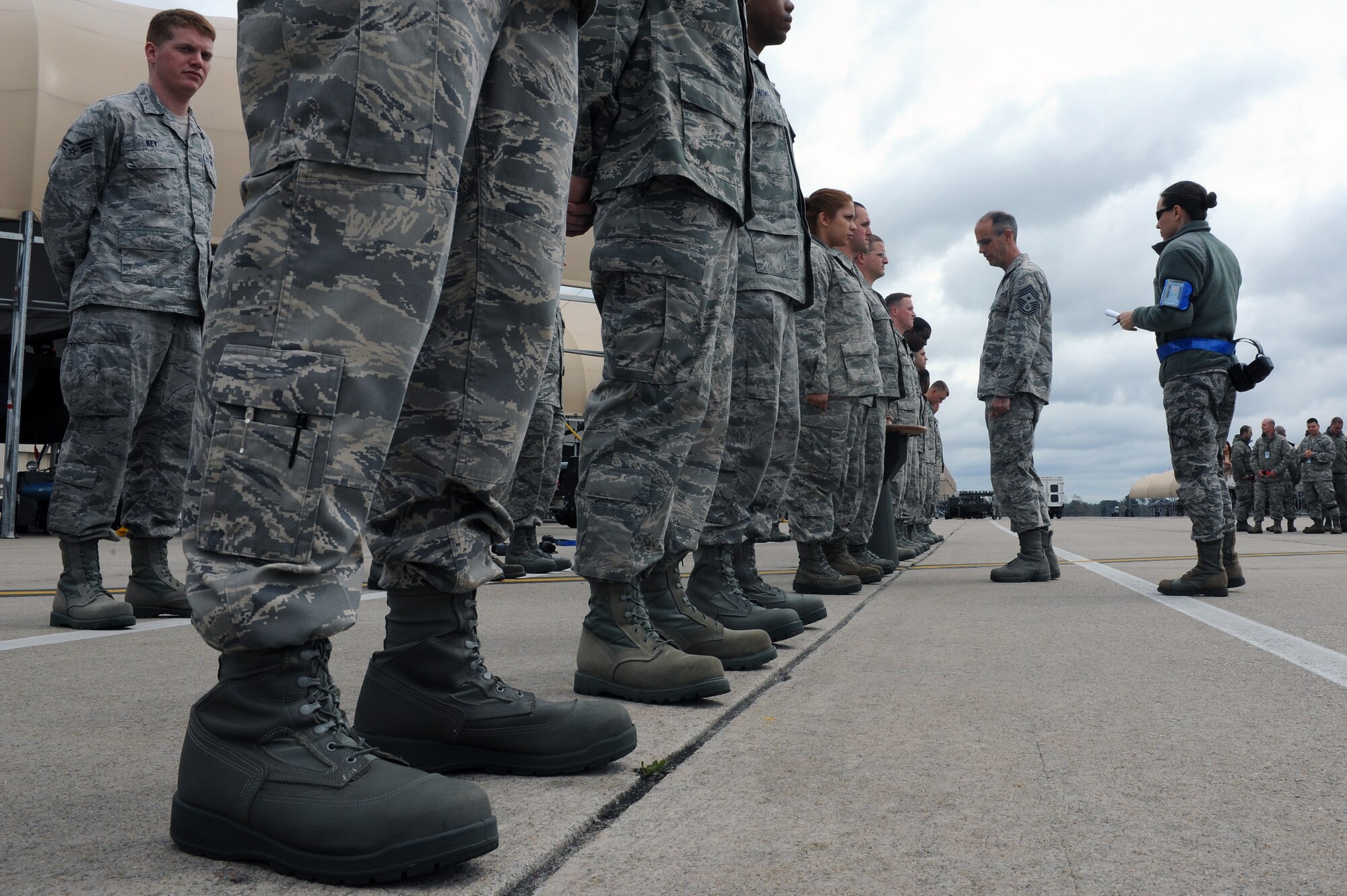 U.S. Air Force Chief Master Sgt. Peter Stone, 4th Fighter Wing command chief, conducts an open-ranks inspection on 4th Aircraft Maintenance Squadron Airmen during a load crew competition on Seymour Johnson Air Force Base, N.C., April 5, 2013. Airmen were inspected on their uniform appearance, military bearing and professionalism. (U.S. Air Force photo by Airman 1st Class John Nieves Camacho/Released)