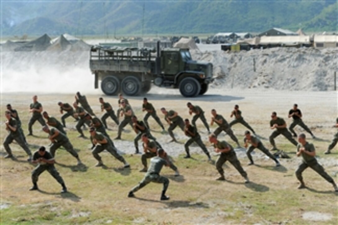 Two Philippine marines demonstrate defensive tactics and techniques to U.S. Marines during a martial arts expertise exchange at Crow Valley, Philippines, on April 10, 2013.  The exchange is part of exercise Balikatan 2013, an annual bilateral training exercise designed to enhance interoperability between both forces and strengthen military-to-military relations.  The U.S. Marines are attached to 3rd Battalion, 6th Marine Regiment, 2nd Marine Division, II Marine Expeditionary Force.  