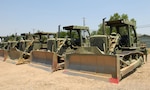 Eight D7 Dozers stand ready to deploy the Red Bluff Armory located in Red Bluff, California. The Dozers are going to be used in Operation Lightning Strike to clear fire lines and what ever else is needed.