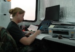 Master Sgt. Jamie Conrad with the 153rd Airlift Wing, Wyoming Air National Guard, updates Modular Airborne Fire Fighting System mission flight data at the 302nd Air Expeditionary Group operations trailer, McClellan Airfield, Sacramento, July 9. The 302nd AEG is made up of eight U.S. Air Force MAFFS-capable C-130 aircraft operating out of McClellan Airfield, Calif. and Navy Reserve and Marine Corps helicopters operating out of Naval Air Station Lemoore, Calif. The 302nd AEG aircraft units include three Air National Guard units, 145th Airlift Wing from Charlotte, N.C., the 146th Airlift Wing from Channel Islands, Calif., and the 153rd Airlift Wing from Cheyenne, Wyo., and one Air Force Reserve unit -- the 302nd Airlift Wing from Peterson Air Force Base, Colo. The 302nd AEG provides unique capabilities and is part of a unified military support effort of U.S. Northern Command to provide assistance to the U.S. Forest Service, CAL FIRE, and the National Interagency Fire Center. USNORTHCOM continues to closely monitor the California wildfires to anticipate additional requests for Department of Defense assistance to local, federal, and state civil authorities.