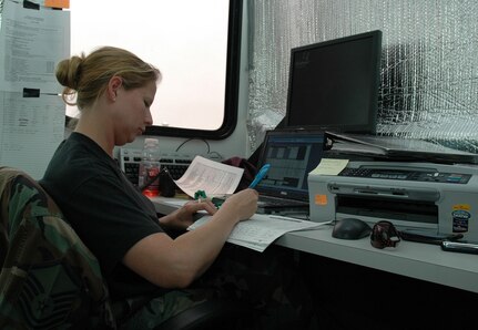 Master Sgt. Jamie Conrad with the 153rd Airlift Wing, Wyoming Air National Guard, updates Modular Airborne Fire Fighting System mission flight data at the 302nd Air Expeditionary Group operations trailer, McClellan Airfield, Sacramento, July 9. The 302nd AEG is made up of eight U.S. Air Force MAFFS-capable C-130 aircraft operating out of McClellan Airfield, Calif. and Navy Reserve and Marine Corps helicopters operating out of Naval Air Station Lemoore, Calif. The 302nd AEG aircraft units include three Air National Guard units, 145th Airlift Wing from Charlotte, N.C., the 146th Airlift Wing from Channel Islands, Calif., and the 153rd Airlift Wing from Cheyenne, Wyo., and one Air Force Reserve unit -- the 302nd Airlift Wing from Peterson Air Force Base, Colo. The 302nd AEG provides unique capabilities and is part of a unified military support effort of U.S. Northern Command to provide assistance to the U.S. Forest Service, CAL FIRE, and the National Interagency Fire Center. USNORTHCOM continues to closely monitor the California wildfires to anticipate additional requests for Department of Defense assistance to local, federal, and state civil authorities.