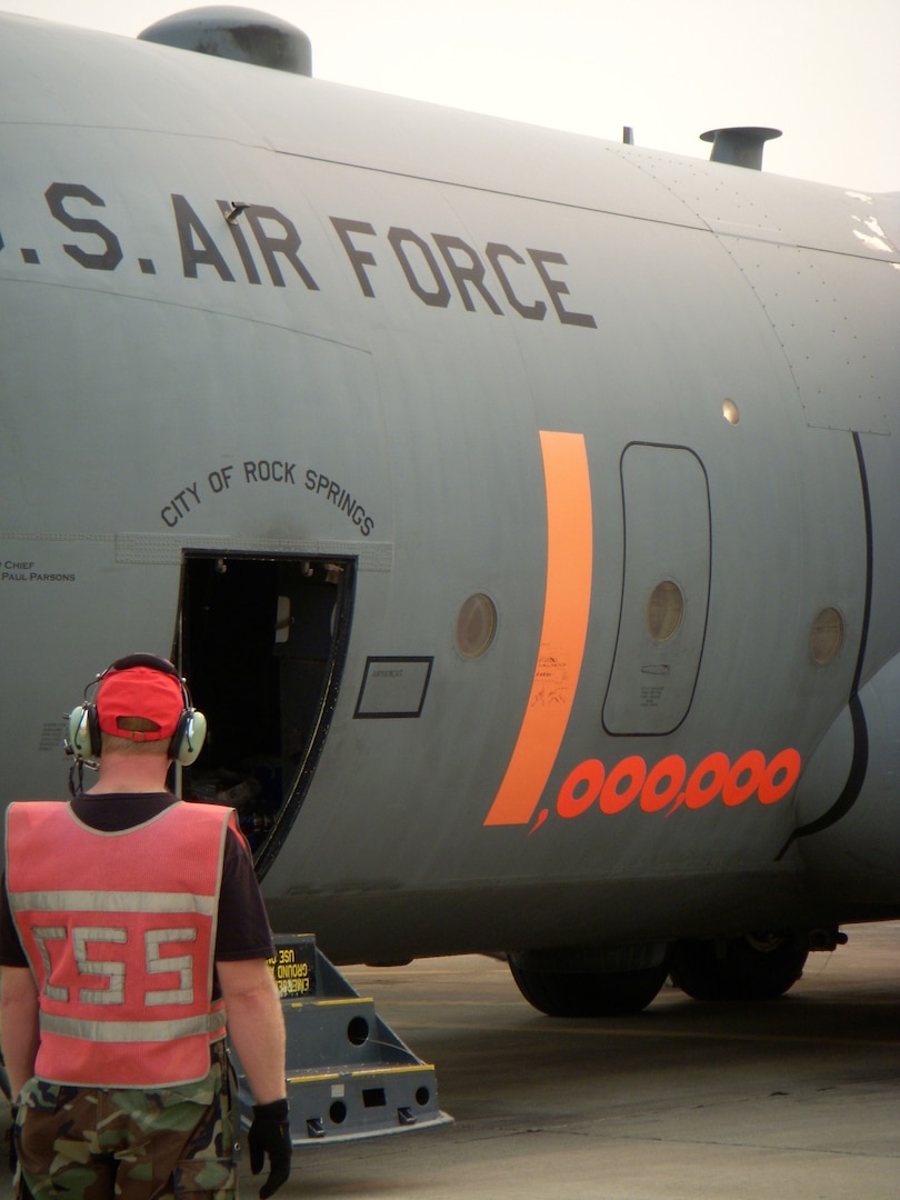 Master Sgt. Mark Withers with the 153rd Airlift Wing, Wyoming Air National Guard, prepares a modular airborne fire fighting system -equipped C-130 for another fire retardant drop on the California wildfires. The 302nd AEG includes eight U.S. Air Force C-130 Hercules aircraft operating from McClellan Airfield, Sacramento, Calif., and eight U.S. Marine Corps medium- and heavy-lift helicopters flying from Naval Air Station Lemoore, Calif., providing unique capabilities and is part of a unified military support effort of U.S. Northern Command to provide assistance to California Department of Forestry and Fire Protection, the National Interagency Fire Center, and U.S. Forest Service operations.