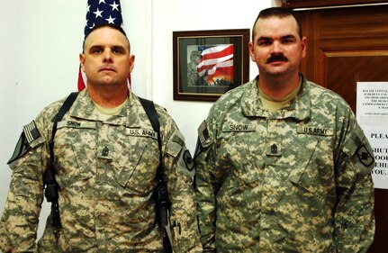 Army Sgt. Maj. Jim Snow and his younger brother, Army 1st Sgt. Joe Snow, are serving their second deployment together in Iraq.