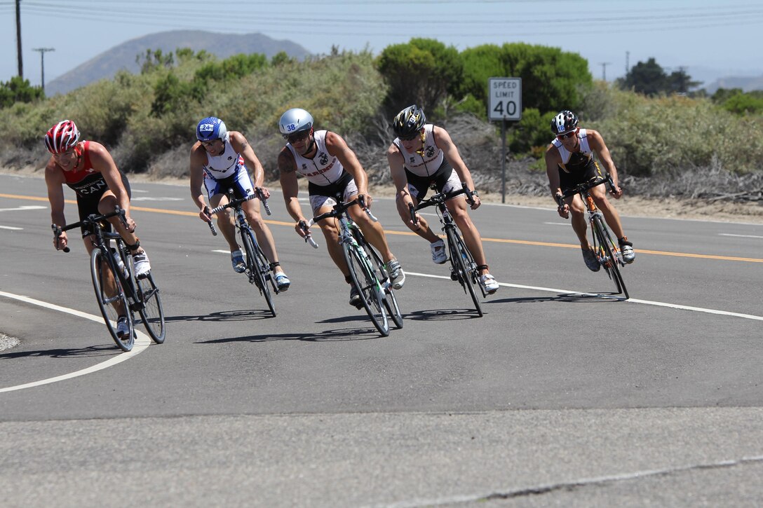 Service members from each branch compete in the cycling leg of the 2012 Armed Forces Triathlon Championship