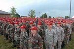 With the activation of a new 200-person detachment, Airmen from the Ohio Air National Guard's 200th RED HORSE squadron stand in formation during the detachment's flagging ceremony July 20 at Mansfield Air Guard Base, Ohio. RED HORSE squadrons are manned by civil engineers who can build and repair air bases and rapidly deploy to recover an air base after a natural disaster or enemy attack.