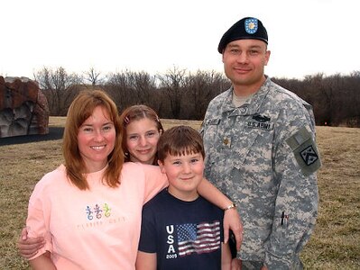 Alaska Army National Guard Maj. Joel Gilbert and his family from left to right, wife, Laura, Kayleigh and Angus, were recently featured on a Nickelodeon "Nick News" special, "Coming Home: When Parents Return from War." Gilbert deployed to Iraq as company commander of Co. A, 3/297th Infantry of Juno, Alaska, from October 2004 to January 2006