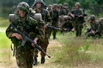 Soldiers with the British army's 4th Battalion, The Yorkshire Regiment, head out on a foot patrol during exercise Patriot '08 at Fort McCoy, Wisc., Monday July 21, 2008. Patriot '08 was a large-scale training exercise that brought together elements from the U.S. Army and Air Force as well as units from the British, Dutch and Canadian armies.