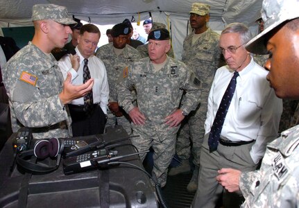 First Lt. Michael Malloy, left, of the National Guard's Joint Communication, Command, Control and Computer Coordination Center in Smyrna, Del., briefs Paul McHale, assistant secretary of defense for homeland defense; LTG H Steven Blum, the chief of the National Guard Bureau; and Deputy Secretary of Defense Gordon England at the Pentagon on July 25, 2008, about the National Guard's Joint Incident Site Communications Capability. Deployed in all 54 states and territories by the National Guard Bureau, JISCC is a communications bridge between first responders and other local, state and federal agencies that can provide initial communications capability within one hour after arrival at an incident scene.