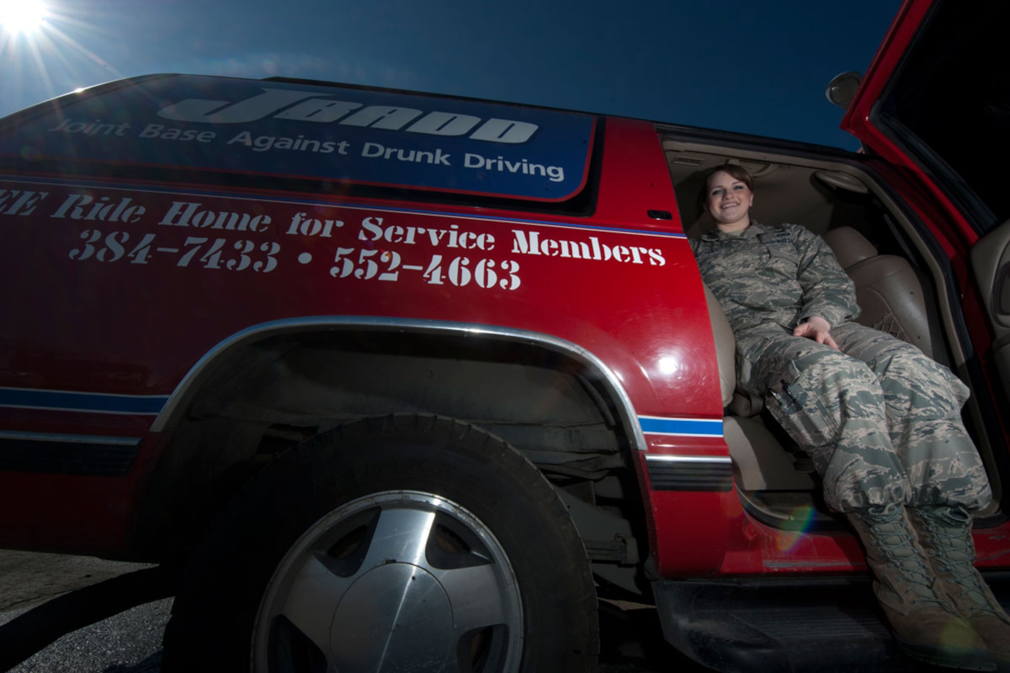 Airman 1st Class Renee Boustead sits in the Joint Base Against Drunk Driving vehicle, donated by Lithia of Anchorage, outside building 655 on Joint Base Elmendorf-Richardson, Alaska April 15. JBADD is an activity of the Better Opportunities for Single Service Members program, or BOSS, and helps service members get home safely after drinking, at no charge and without questions. To contact JBADD, for transportation or to volunteer, call 384-7344 or 552-4663. Boustead serves in aircrew flight equipment under 3rd Operations Support Squadron with duty at the 962nd Airborne Air Control Squadron, and is the president of JBADD. Her hometown is Elk Grove, Calif. (U.S. Air Force photo/Staff Sgt. Robert Barnett)