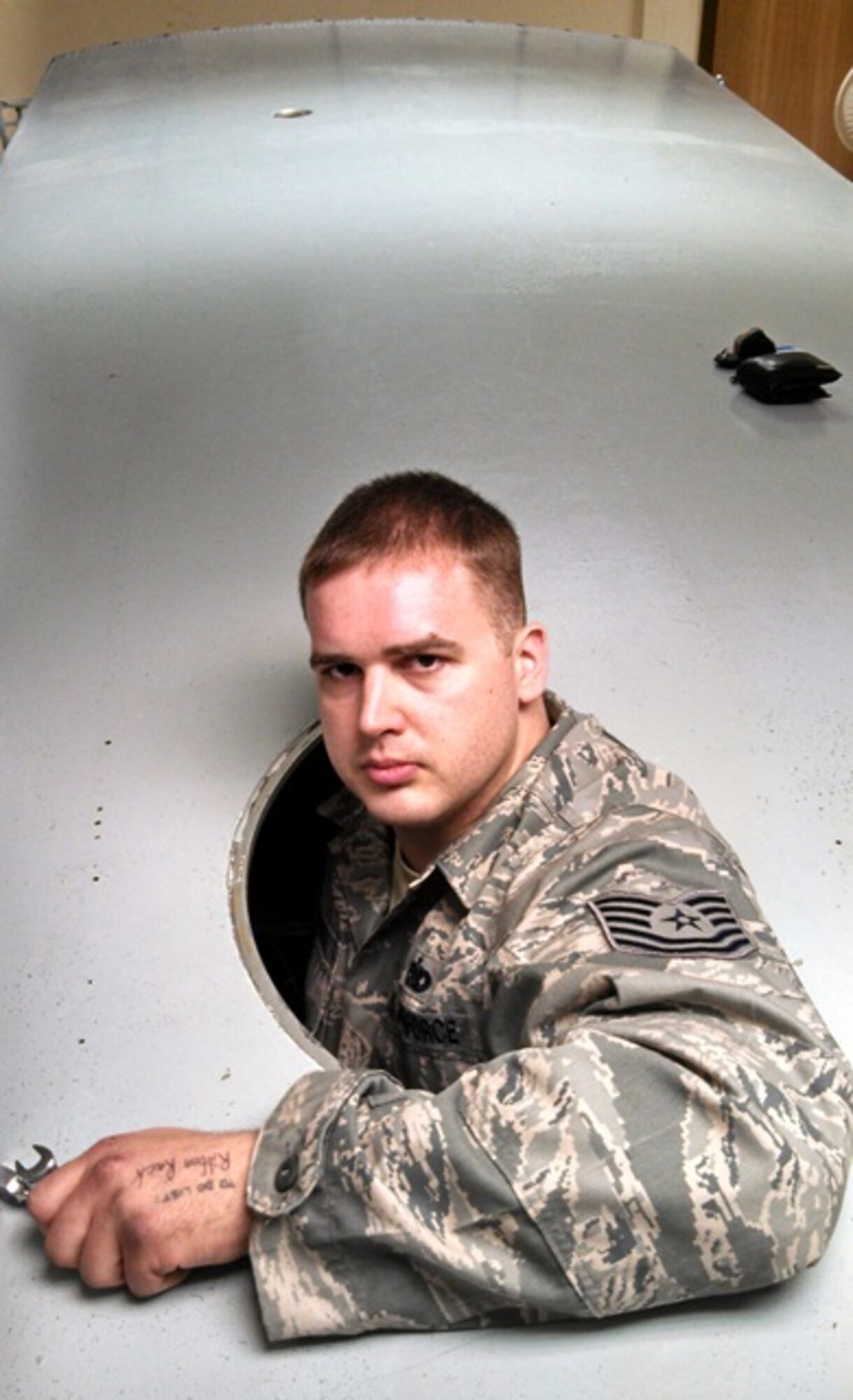 Tech. Sgt. Jeremy Blackwell, an Aircraft Fuel Systems apprentice student, works on a fuel tank during training at the 361st Training Squadron at Sheppard Air Force Base, Texas, April 17, 2013.  Blackwell earned the ACE award for finishing the course with a 100 percent academic average. (U.S. Air Force courtesy photo)