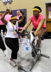 Staff Sgt. Althea Hunter pedals for a children’s local charity during the Spin for Kids fundraiser on April 6, 2013, in the city of Grand Forks, N.D.  Hunter was named the Grand Forks Air Force Warrior of the Week for the third week of April 2013. (U.S. Air Force photo/Airman 1st Class Xavier Navarro)